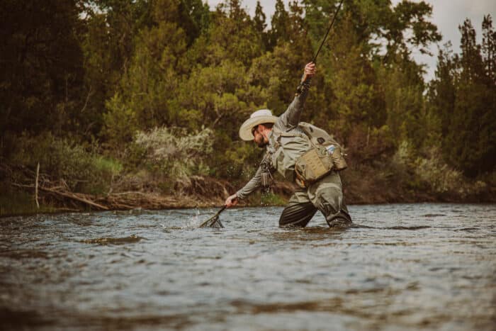 Fisherman participating in Upper Canyon Outfitters Grand Slam Week where flyfishing enthusiasts get to fish five different types of water and six different species of fish.